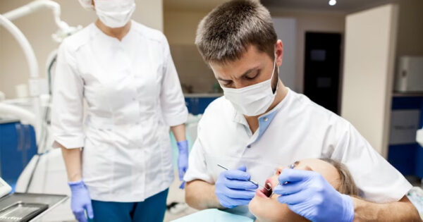 How do I find a dentist working with the Canadian dental plan